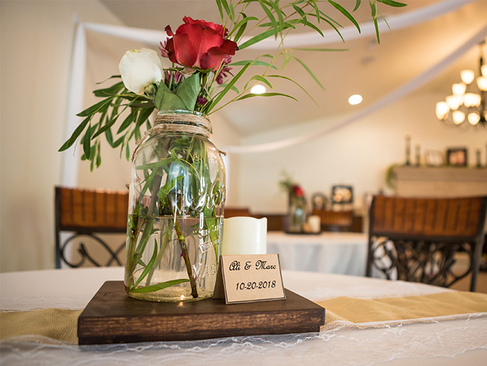 DIY Wooden Slab Centerpieces With Jars and Flowers